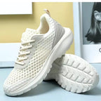 tênis feminino bege creme e de malha respirável presença