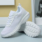 tênis feminino branco e de malha presença