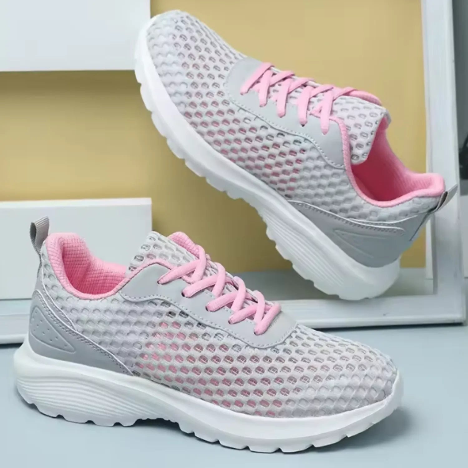 tênis feminino cinza e rosa malha delicadeza presença