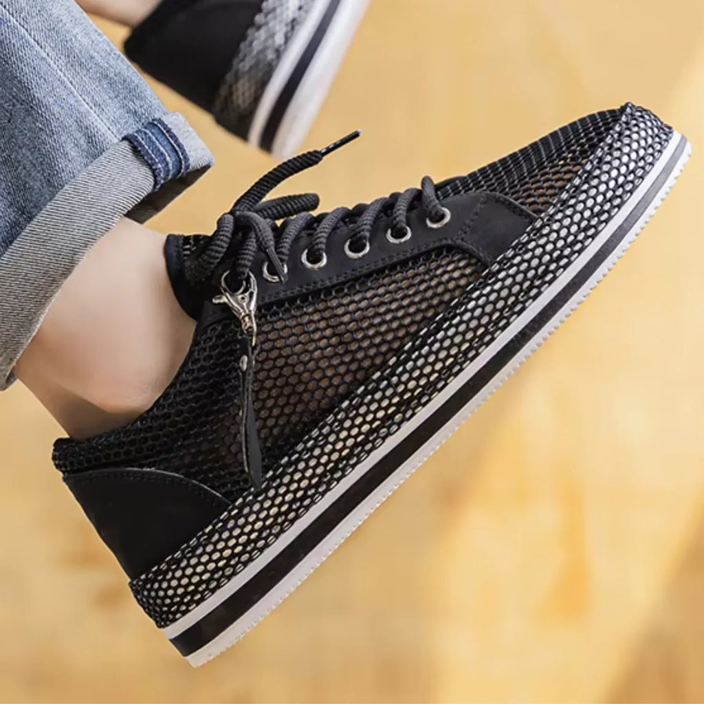 tênis masculino preto de malha e respirável